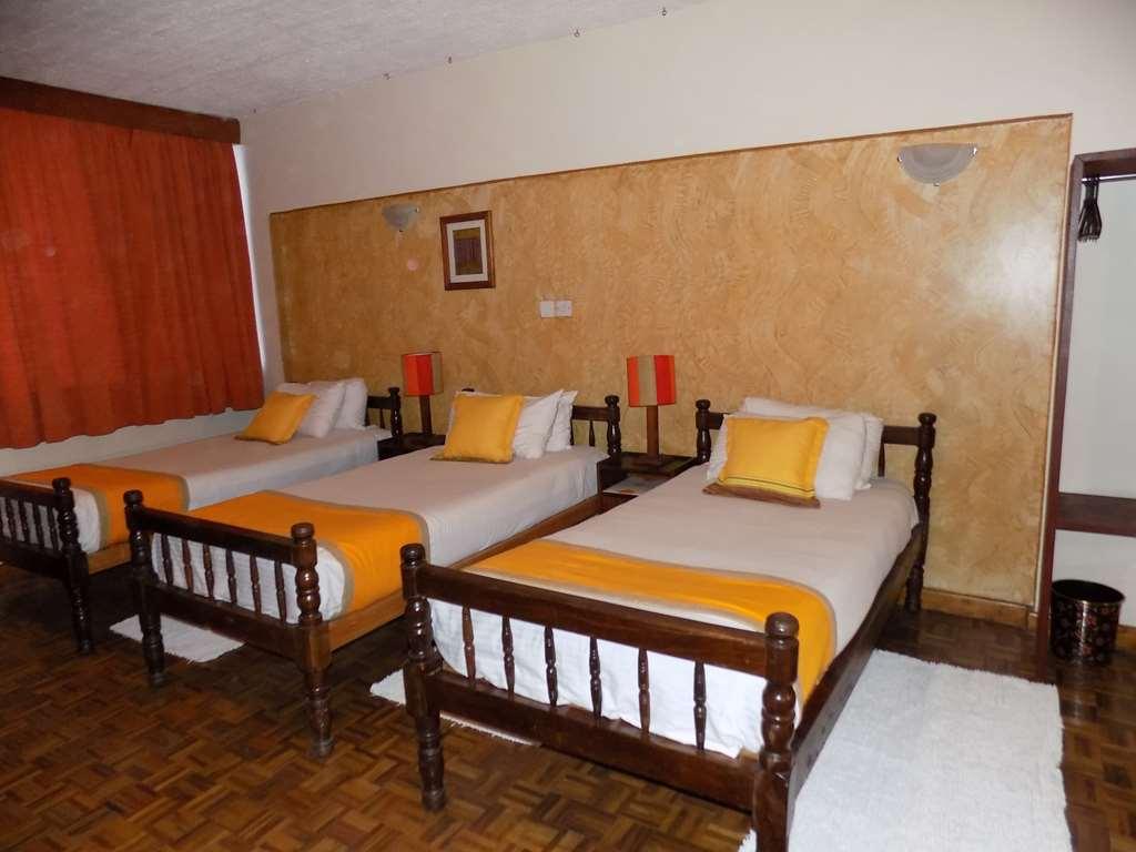 Kenya Comfort Suites Найроби Номер фото